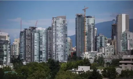  ?? DARRYL DYCK/THE CANADIAN PRESS FILE PHOTO ?? Vancouver is ranked among global cities most at risk of a housing bubble for the second time this year as the cost of houses continue to rise.