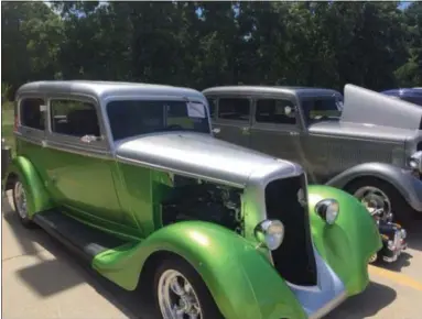  ?? KEVIN MARTIN — THE MORNING JOURNAL ?? A 1934 green Plymouth model #80 was one of many classic cars featured at the seventh annual LaGrange IGA Car CruiseIn on July 29 at 540 N. Center St. All proceeds benefit the LaGrange Fire Department.