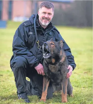  ?? Picture: Steven Brown. ?? PC Craig Menzies with Axel.