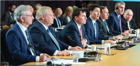  ?? PAUL CHIASSON / THE CANADIAN PRESS ?? Prime Minister Justin Trudeau addresses the opening session of Friday’s first ministers meeting in Montreal, which did not see a walkout by Doug Ford, despite earlier threats.