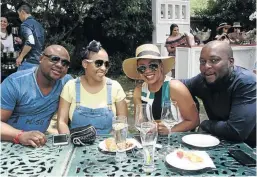  ??  ?? Tiyani and Bontle Hlaisi with Celiwe and Masilo Bopape cooling off at the Joburg Wine Club event.