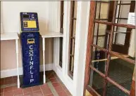  ?? ?? A CoinFlip cryptocurr­ency ATM inside the entrance to the Cheyenne, Wyo., headquarte­rs of Tacen, a cryptocurr­ency exchange planned to launch in 2023.