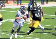  ?? Joe Sargent / Getty Images ?? Broncos’ backup quarterbac­k Jeff Driskel looks to make a pass against the Steelers on Sunday at Heinz Field in Pittsburgh.
The Denver Post