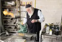  ?? (Oriel Perel) ?? DANIEL KAFRI working on one of his bronze statues in his studio.