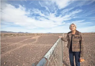  ?? CHERYL EVANS/THE REPUBLIC ?? Amelia Flores, Colorado River Indian Tribe chairwoman, walks out to a geoglyph at the Blythe Intaglios in California.