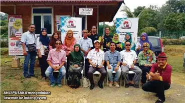  ??  ?? AHLI PUSAKA mengadakan lawatan ke ladang ayam.