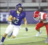  ?? Special to NWA Democrat-Gazette/DAVID BEACH ?? Fayettevil­le’s Connor Flannigan (left) runs the ball as Cabot’s Masen Wade gives chase Friday at Harmon Stadium in Fayettevil­le.