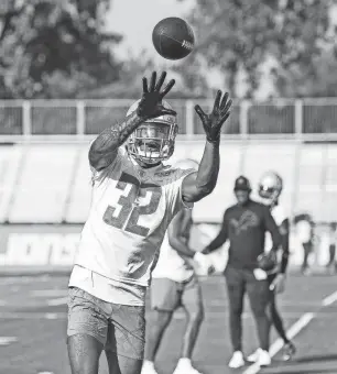  ?? HAN/DETROIT FREE PRESS
JUNFU ?? Lions safety Brian Branch makes a catch during training camp in Allen Park last month.