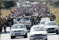  ?? PICTURE: ANDREAS MATHIOS ?? Protesters march on the R102 from Shaka’s Head towards Ballito yesterday morning.