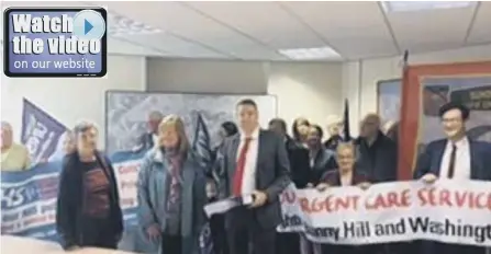  ??  ?? KONP Sunderland &amp; District campaigner­s and Coun Kevin Johnston (centre) at Sunderland Civic Centre.