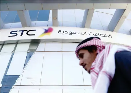  ?? Shares in the Saudi Telecom Co. rose following news of an agreement on royalty fees paid to the government. ??