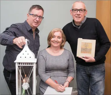  ??  ?? Getting settled in the new ‘Open Arms Kerry’ office are Roger Harty, Rita O’Sullivan Crean and Gerard Collins.