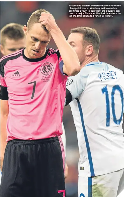  ??  ?? ■ Scotland captain Darren Fletcher shows his disappoint­ment at Wembley last November, but Craig Brown is confident the country can reach a major Finals for the first time since he led the Dark Blues to France 98 (inset).