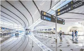  ??  ?? Photo shows the interior of Beijing’s Daxing airport.