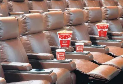  ?? CINEMARK/COURTESY ?? Cinemark's Davie and Boca Raton theaters have installed seats, along with restaurant­s and bars.