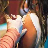  ?? Joseph Prezioso / TNS ?? A 5-year-old child receives the Pfizer-BioNTech COVID-19 vaccine for young children at Hartford Hospital on Nov. 2.