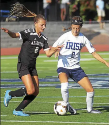  ?? GREGG SLABODA — TRENTONIAN FILE PHOTO ?? Notre Dame’s Taylor Whitlock, right, scored the opening goal for the Irish in a 2-1 win over Robbinsvil­le.