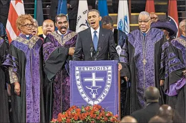  ?? RICHARD ELLIS/EPA ?? President Barack Obama sings “Amazing Grace” during the funeral for pastor and state Sen. Clementa Pinckney in Charleston, S.C., on Friday. Pinckney was one of nine people slain in an attack on a historic black church this month.