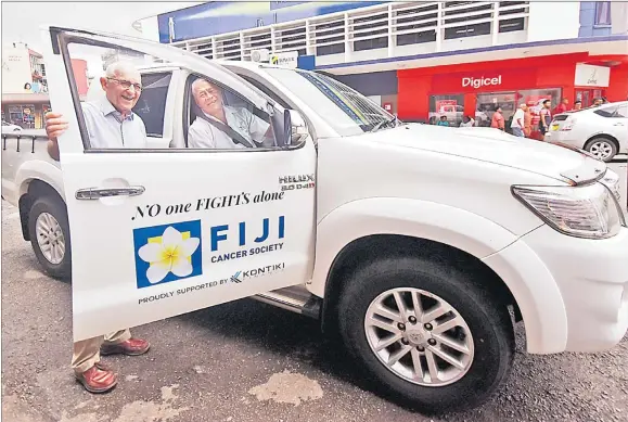  ?? Picture: RAMA ?? Fiji Cancer Society president Makrava Wilson (right) receives the new vehicle from Kontiki Finance chairman Daryl Tarte in Suva on Thursday.