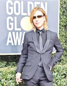  ?? — AFP photo ?? In this file photo taken on Jan 7 Yoshiki Hayashi arrives for the 75th Golden Globe Awards in Beverly Hills, California.