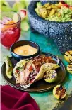  ?? MANJA WACHSMUTH ?? Turn dinner into a fiesta with delicious pork belly tacos.