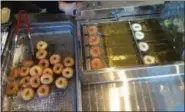  ?? DONNA ROVINS — DIGITAL FIRST MEDIA ?? Mini donuts being made Monday, Dec. 10 at DonutNV in Pottstown. The location is the first brick and mortar shop for the company that has operated mobile kiosks since 2014.