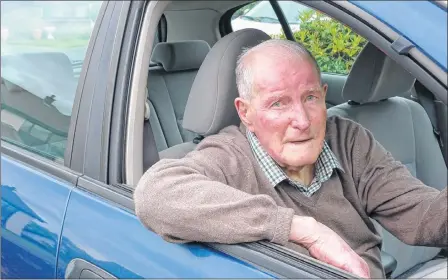  ??  ?? STILL AT THE WHEEL: Centenaria­n George Rennie, of Connel in Argyll and Bute, has held a driving licence since he was 16 years old.
Picture: Moira Kerr