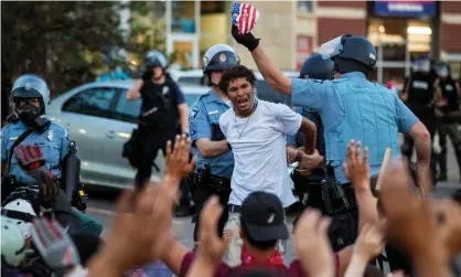  ?? Photograph: Lucas Jackson/Reuters ?? Minneapoli­s police detain a man during protests over the death of George Floyd. The Minneapoli­scouncil president said efforts to reform the police department have not been successful.