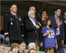  ?? MICHAEL CONROY — THE ASSOCIATED PRESS ?? Vice President Mike Pence, front center, stands during the playing of the national anthem before an NFL football game between the Indianapol­is Colts and the San Francisco 49ers, Sunday in Indianapol­is.