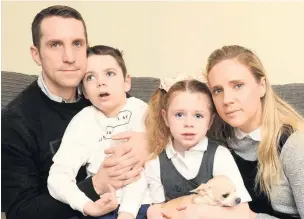  ??  ?? Lucy and Mike Carroll with children Ollie, 8 and Amelia, 6, who both have Batten disease - a genetic condition, currently incurable