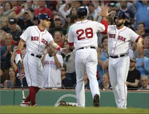 ?? File photo ?? The Boston Red Sox had the MLB’s highest payroll at $230 million, but the rest of baseball cut payroll for the first time since 2010.