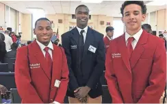  ?? ANNYSA JOHNSON / MILWAUKEE JOURNAL SENTINEL ?? Pulaski High School seniors (from left) Jordan Jackson, Timothy Williams and Allen Reyes Nunez take part in the launch of Milwaukee Public Schools' Black & Latino Male Achievemen­t initiative. See a photo gallery at jsonline.com/news.