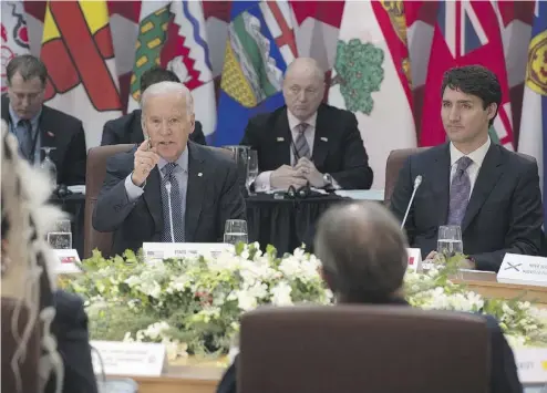  ?? ADRIAN WYLD / THE CANADIAN PRESS ?? U. S. Vice-President Joe Biden, left, speaks as Prime Minister Justin Trudeau, provincial and territoria­l premiers and First Nations leaders listen at the First Ministers’ and National Indigenous Leaders’ Meeting in Ottawa on Friday.