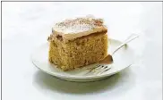  ?? THE NEW YORK TIMES FOOD STYLIST: SIMON ANDREWS. DAVID MALOSH / ?? Seis leches cake, a dense, puddinglik­e cake flavored with cinnamon and rum. Adding dulce de leche and two kinds of coconut milk to a tres leches cake makes it supremely creamy and rich.