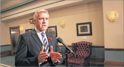  ?? JAMES MCLEOD/THE TELEGRAM ?? Premier Dwight Ball speaks to members of the media Tuesday afternoon outside the House of Assembly.