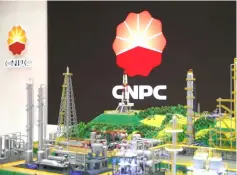  ??  ?? The logo of CNPC is pictured at the 26th World Gas Conference in Paris, France. A gas field developmen­t contract with France’s Total, and China’s state-owned CNPC remains unchanged, a senior Iranian oil official said according to the oil ministry news agency SHANA. — Reuters photo