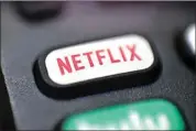  ?? JENNY KANE/ AP, FILE ?? A logo for Netflix is seen on a remote control in Portland, Ore., on Aug. 13, 2020.