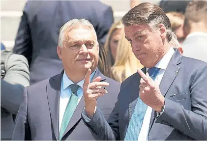  ?? REUTERS ?? Juntos. El ex presidente de Brasil Jair Bolsonaro, con el premier húngaro Viktor Orban en Argentina.