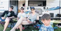  ?? PHOTO: SHANNON THOMSON ?? Sitting pretty . . . Camping at the Wanaka Lakeview Holiday Park for Labour Weekend are Queenstown locals (from left) Quintin McCarthy, Dean Moyes, Carly McCarthy and Leon Moyes (5).
