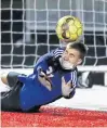  ?? MIKE MANTUCCA/DAILY SOUTHTOWN ?? Lockport’s Jakub Lassak makes a save in the penalty-kick shootout Tuesday against Bolingbroo­k.