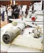  ??  ?? A picture taken on June 19, 2018 shows debris of Iranianmad­e Ababil drones displayed in Abu Dhabi, which the Emirati armed forces say were used by Houthi rebels in Yemen in battles against the coalition forces led by the UAE and Saudi Arabia. The United Arab Emirates has US-trained troops fighting alongside the Yemeni army against the Iranbacked Houthi rebels. (AFP)