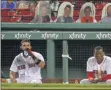  ?? STAFF PHOTO BY STUART CAHILL/ MEDIANEWS GROUP/BOSTON HERALD ?? BOSTON MA. - AUGUST 7: A cutout of Boston Red Sox Dustin Pedroia sits behind the dugout as the Red Sox take on the Blue Jays at Fenway Park on August 7, 2020 in Boston, MA.