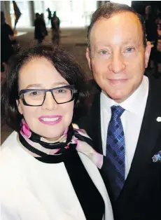  ??  ?? B.C. Lieutenant-Governor Janet Austin feted Courage To Come Back awards chairman Lorne Segal when the event reportedly raised $3 million.