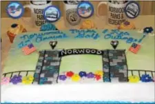  ??  ?? The golf outing showed borough pride with a Norwood Arch cake.