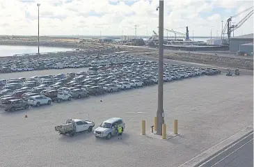  ??  ?? Imported cars are lined up at the Port in Darwin.