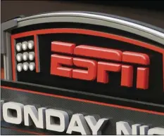  ?? AP PHOTO/DAVID KOHL ?? This Sept. 16, 2013, file photo shows the ESPN logo prior to an NFL football game between the Cincinnati Bengals and the Pittsburgh Steelers, in Cincinnati.