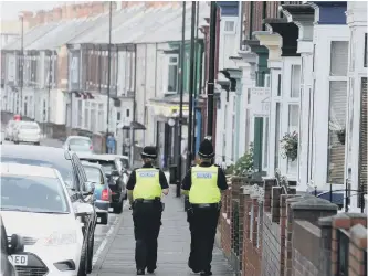  ??  ?? Police in Roker Avenue.