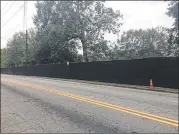  ?? BECCA GODWIN/BECCA.GODWIN@ AJC.COM ?? A fence has been put up along Boulevard blocking the parking lot at Grant Park. The lot will remain closed until 2019 as a new parking deck and other facilities are built.