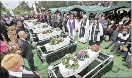  ?? PICTURE: MATTHEW JORDAAN ?? Thousands of mourners attended the funeral at the graveyard to bury the eight children –11 of the 14 – who died in the Rheenendal bus crash.
