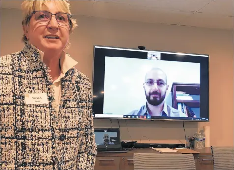  ?? KAREN ANN CULLOTTA/CHICAGO TRIBUNE ?? “Tele-therapy” services are now commonplac­e in the industry, including at the Josselyn Center in Northfield, Ill., where its president, Susan Resko, partners with experts such as Dr. Hossam Mahmoud, on screen.